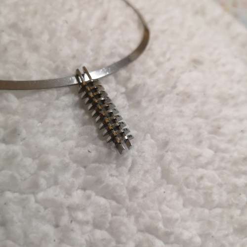 Avant-garde flat wire choker with pendant set. choker has a catch at the back