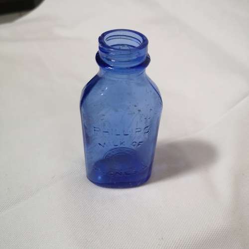 Vintage cobalt blue Philips milk of magnesia bottle. Chemist Bottle