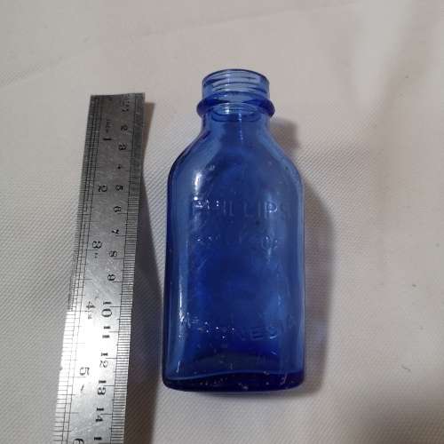 Vintage cobalt blue Philips milk of magnesia bottle. Chemist Bottle