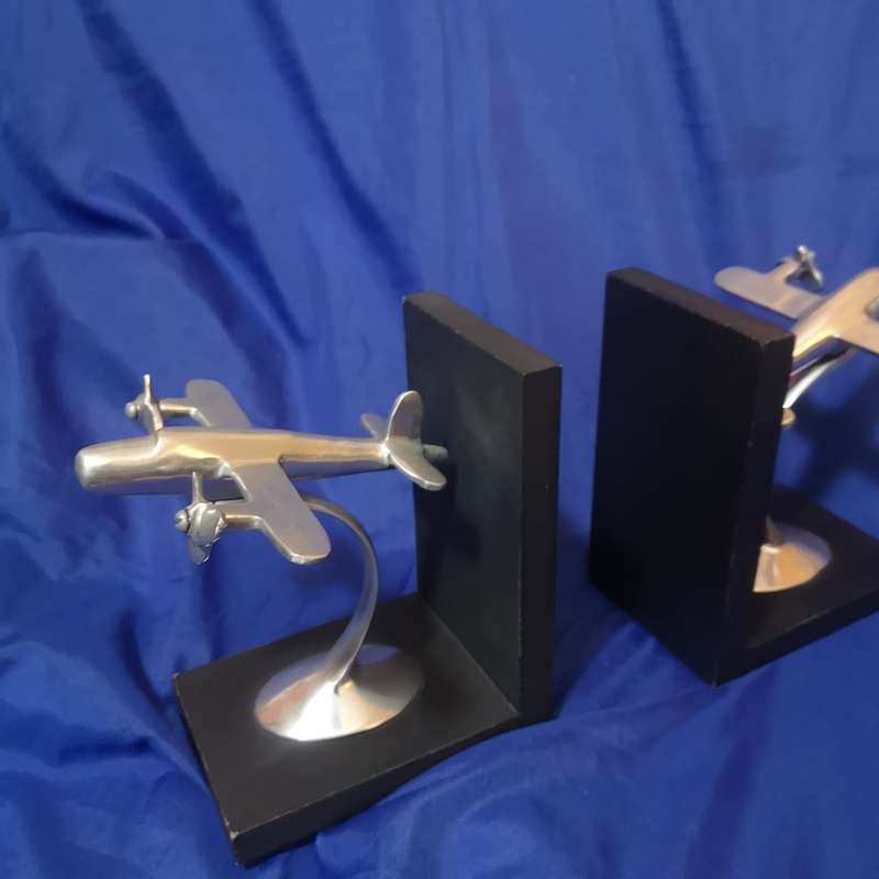 Retro Twin Prop Airplane Bookends Pier One. Propellors are free to turn. Solid