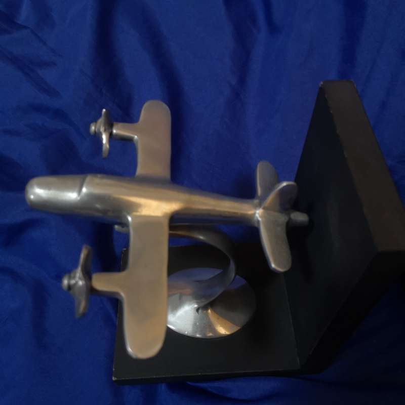 Retro Twin Prop Airplane Bookends Pier One. Propellors are free to turn. Solid