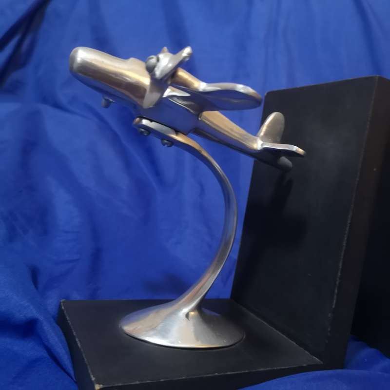 Retro Twin Prop Airplane Bookends Pier One. Propellors are free to turn. Solid