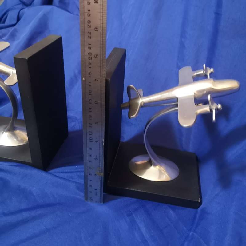 Retro Twin Prop Airplane Bookends Pier One. Propellors are free to turn. Solid