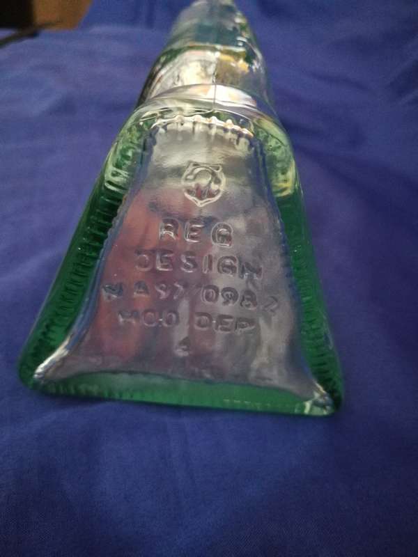 Table Mountain shaped glass bottle. Vintage item with lid and labelling