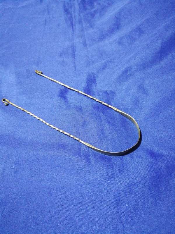 Rare Antique silver tongue cleaner.