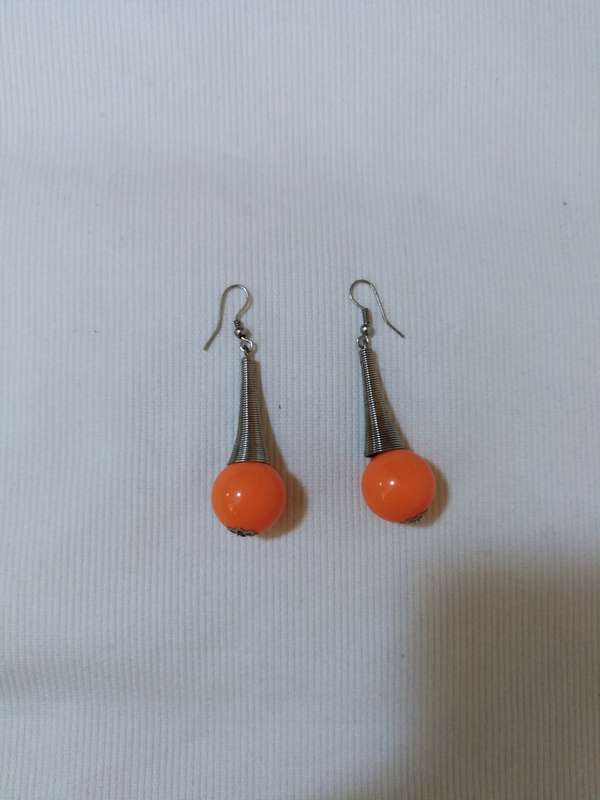 Eye catching, arty hanging orange bead earrings