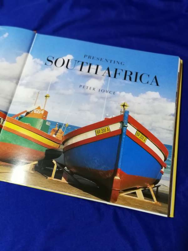 Presenting South Africa- Hardcover with dust cover. 2004