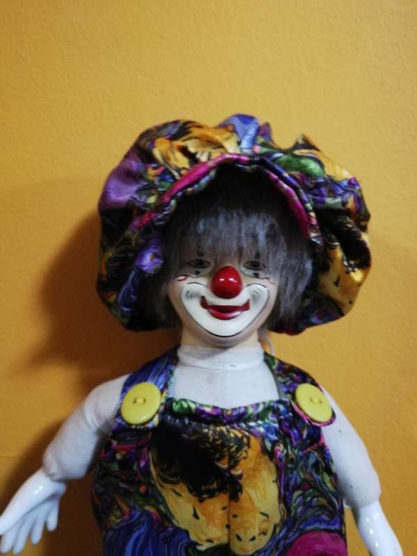 Vintage Porcelain Clown with stand