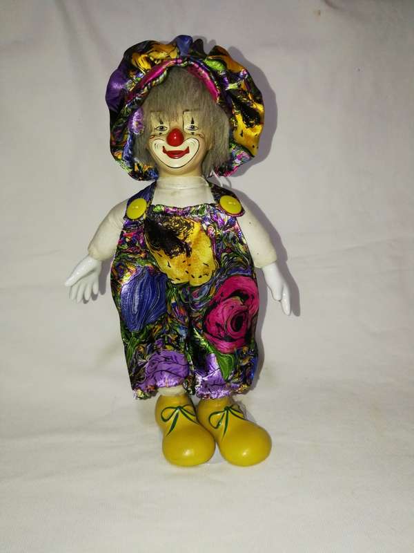 Vintage Porcelain Clown with stand