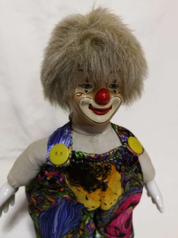 Vintage Porcelain Clown with stand