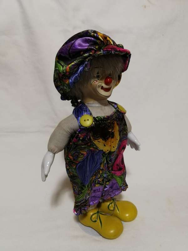 Vintage Porcelain Clown with stand