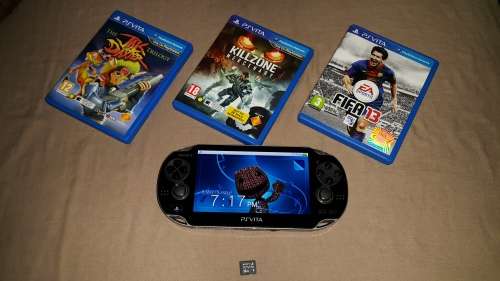 PS VITA with 32gb mem card and 3 games