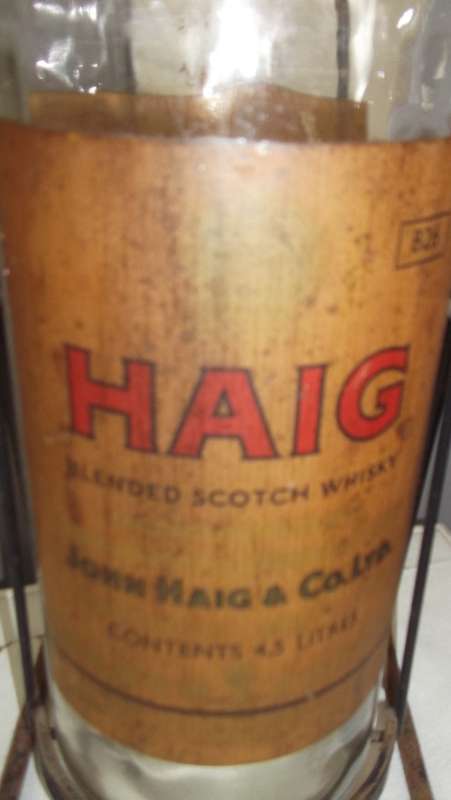 HAIG 4.5 LITRE WHISKEY BOTTLE ON CRADLE