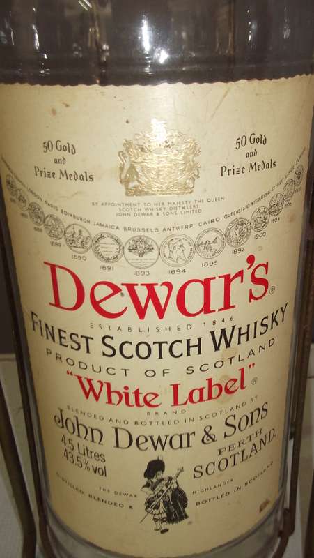 DEWAR'S WHITE LABEL 4.5 LITRE WHISKEY BOTTLE ON CRADLE