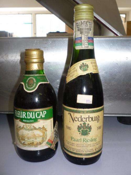 2 SMALL (250 ml) BOTTLES OF WINE - NEDERBURG PAARL RIESLING (1980) AND FLEUR DU CAP RIESLING (1975)