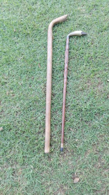 2 wooden walking sticks