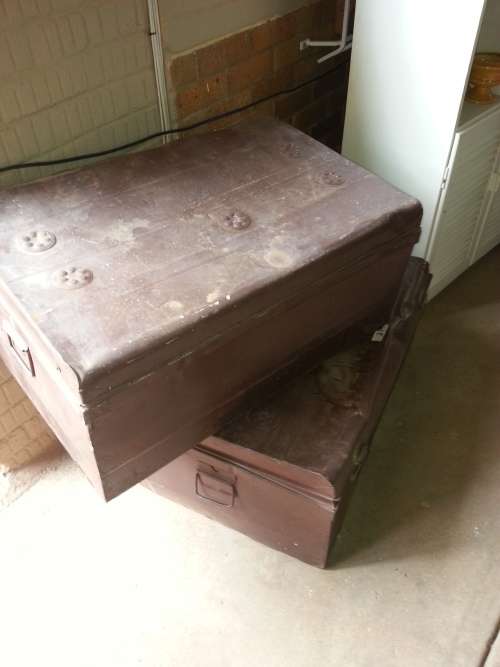 2 stunning brown metal trunks