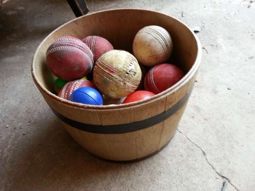 BUCKET FULL OF OLD BALLS