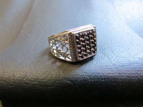 Exquisite Sterling Silver Ring with Black Stones