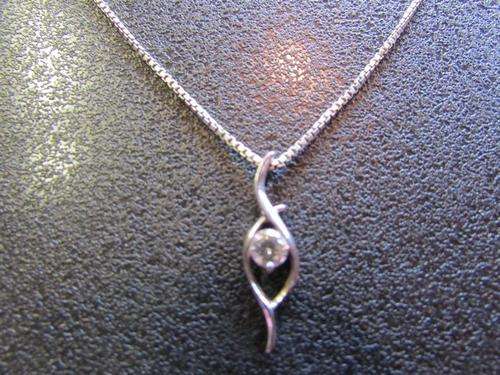 A Lovely Dainty Sterling Silver Pendant and Chain