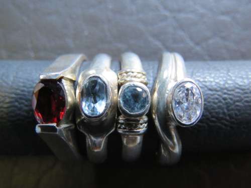 4 Exquisite Sterling Silver Rings as one lot