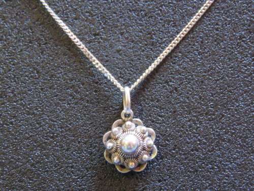 A Very Unusual Sterling Silver Pendant and Chain