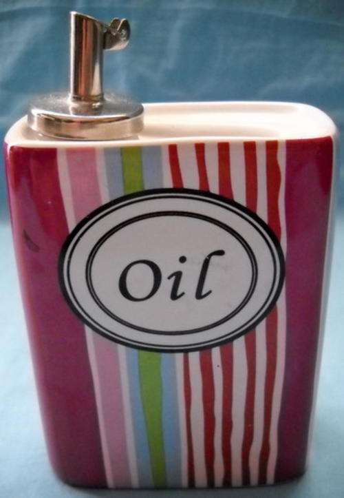 CONTAINER FOR OIL NOT PLASTIC NO CHIPS OR CRACKS