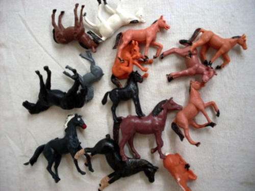 12 SMALL PLASTIC HORSES