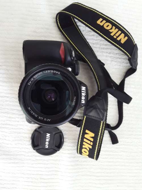 Nikon D3100, 8GB card, charger, cable, bag and tripod in bag