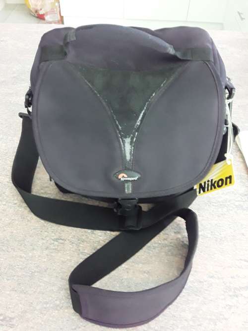 Nikon D3100, 8GB card, charger, cable, bag and tripod in bag