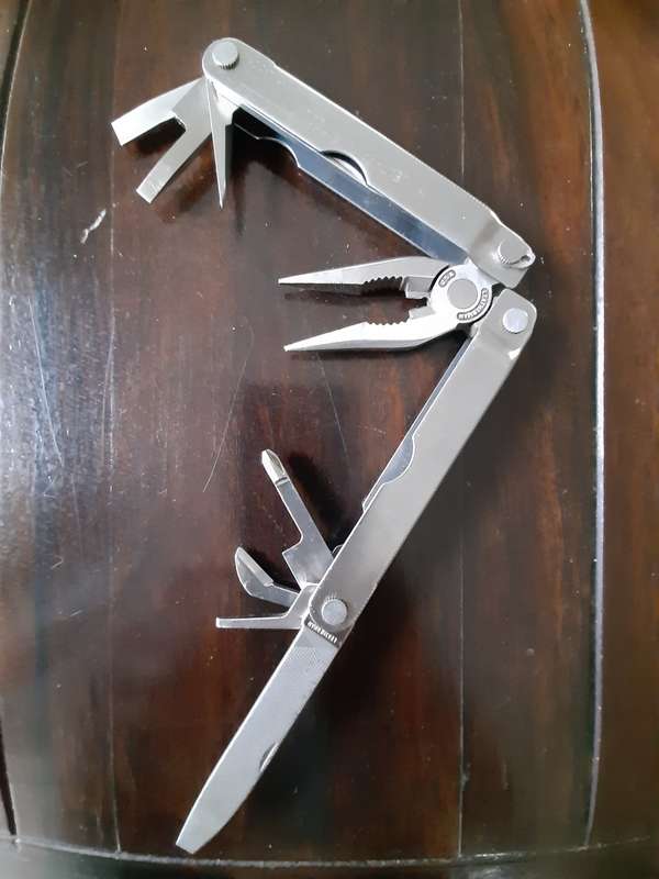 Leatherman LM832518 Heritage PST Multi-tool number 0997 with leather pouch, like new