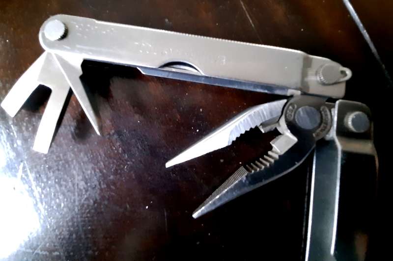 Leatherman LM832518 Heritage PST Multi-tool number 0997 with leather pouch, like new