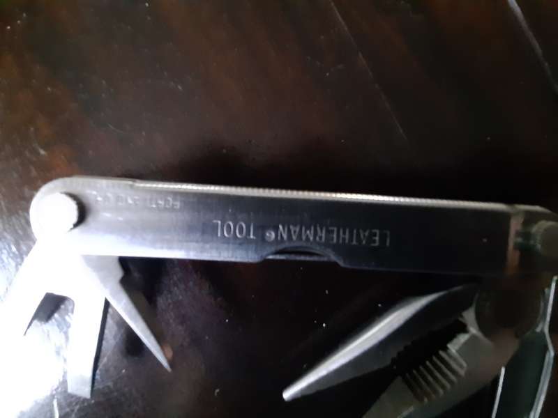 Leatherman LM832518 Heritage PST Multi-tool number 0997 with leather pouch, like new
