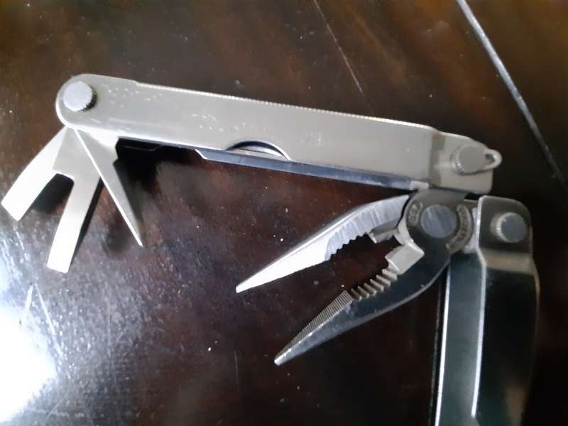 Leatherman LM832518 Heritage PST Multi-tool number 0997 with leather pouch, like new