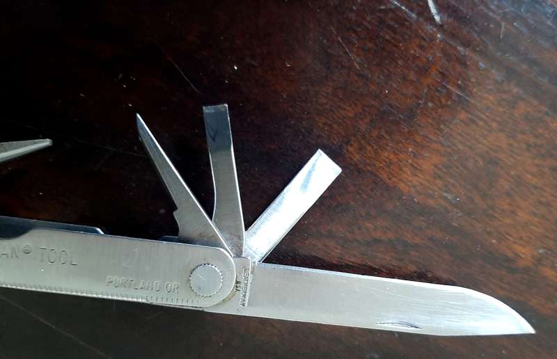 Leatherman LM832518 Heritage PST Multi-tool number 0298 with leather and synthetic pouch, like new