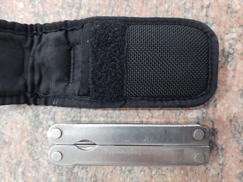Leatherman LM832518 Heritage PST Multi-tool number 0298 with leather and synthetic pouch, like new