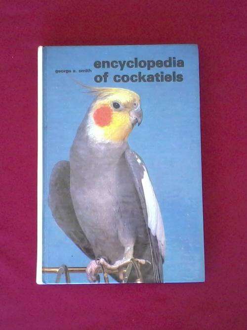 Encyclopedia of Cockatiels by George e Smith. Hard cover book. 256 pages.