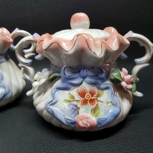 Highly Decorative Porcelain Tea Pot, Milk Creamer and Sugar Pot