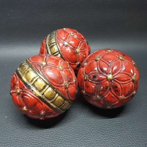 Three Highly Decorative Lacquered Wood Balls