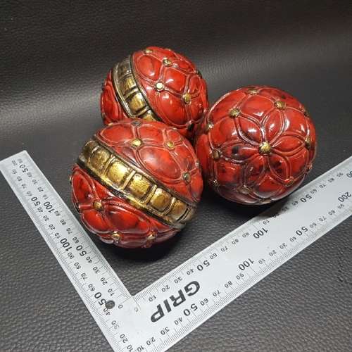 Three Highly Decorative Lacquered Wood Balls