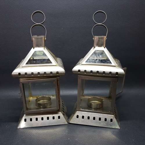 Two Large Pressed Metal Tee Lite Lanterns (Bid for Both)