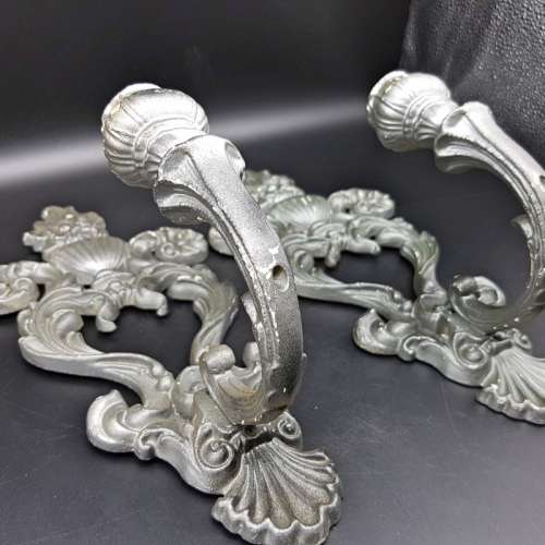 Two Ornate Cast Metal Candle Wall Scones