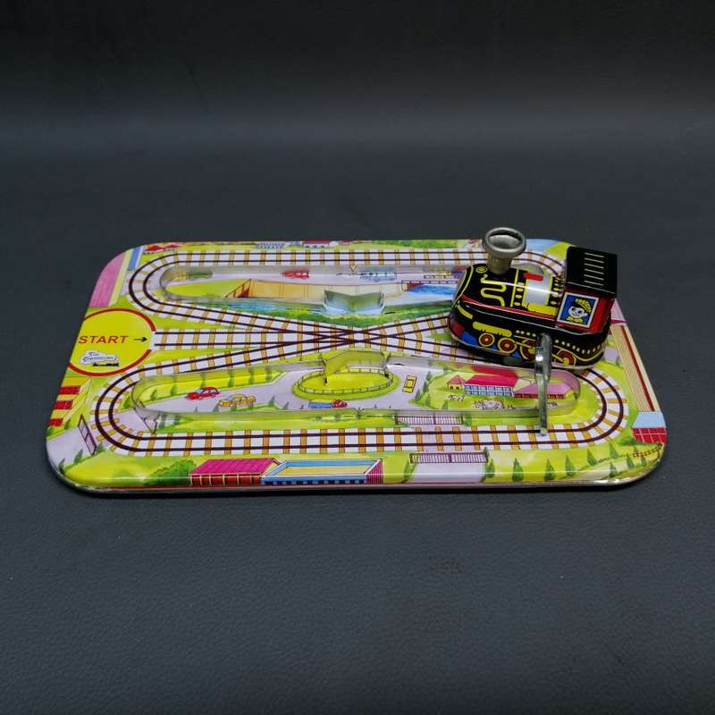 Highly Collectible Lithographed Wind Up Tin Toy Train and Track!!!