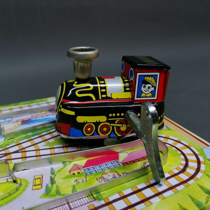 Highly Collectible Lithographed Wind Up Tin Toy Train and Track!!!