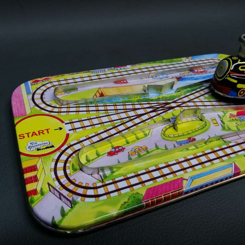 Highly Collectible Lithographed Wind Up Tin Toy Train and Track!!!