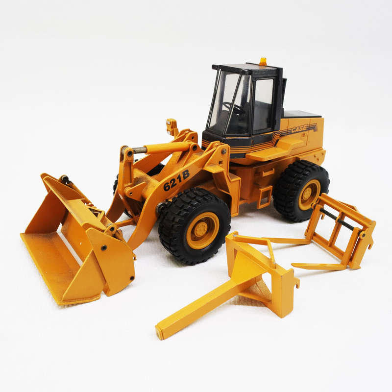 Original Die Cast Metal German CASE 621 B Front Loader and Attachments !!!