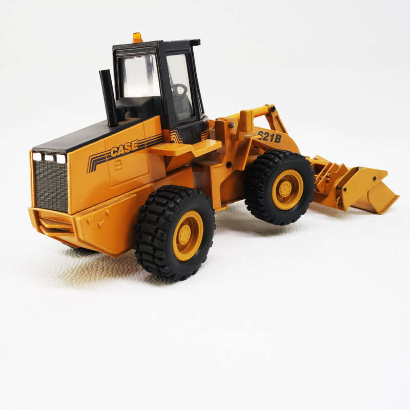 Original Die Cast Metal German CASE 621 B Front Loader and Attachments !!!