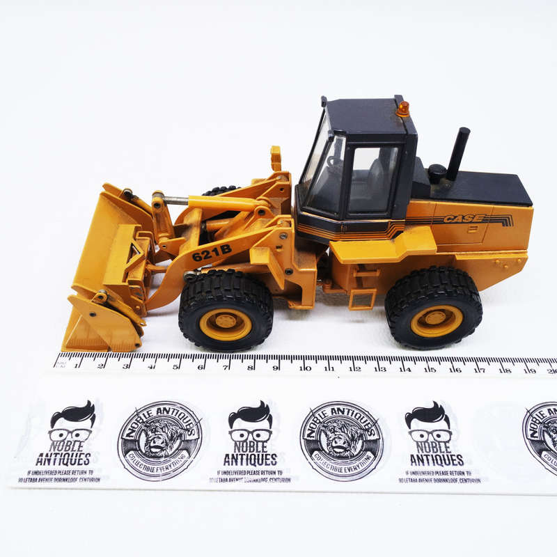 Original Die Cast Metal German CASE 621 B Front Loader and Attachments !!!
