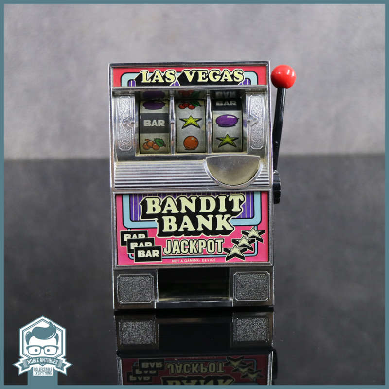 Original Vintage Bandit Bank Working Slotmachine and Savings Bank!!!