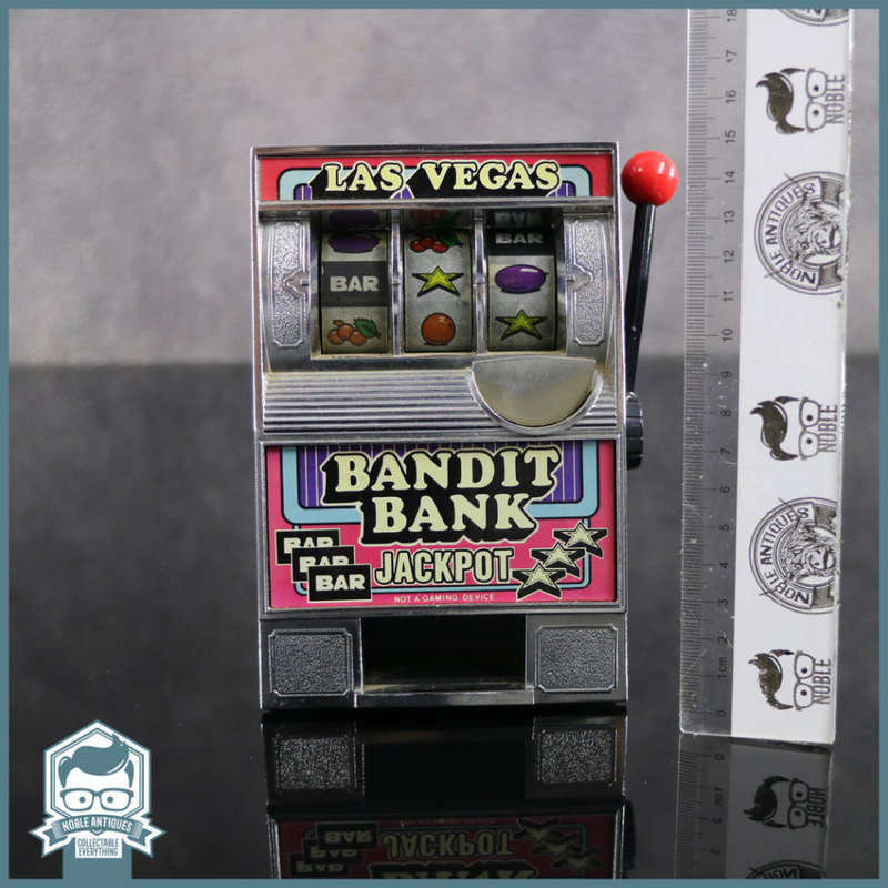 Original Vintage Bandit Bank Working Slotmachine and Savings Bank!!!